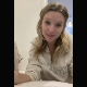A blonde, British girl records herself shitting into a toilet while standing beside it and bending over. 720P HD Vertical format video. About 2 minutes.
